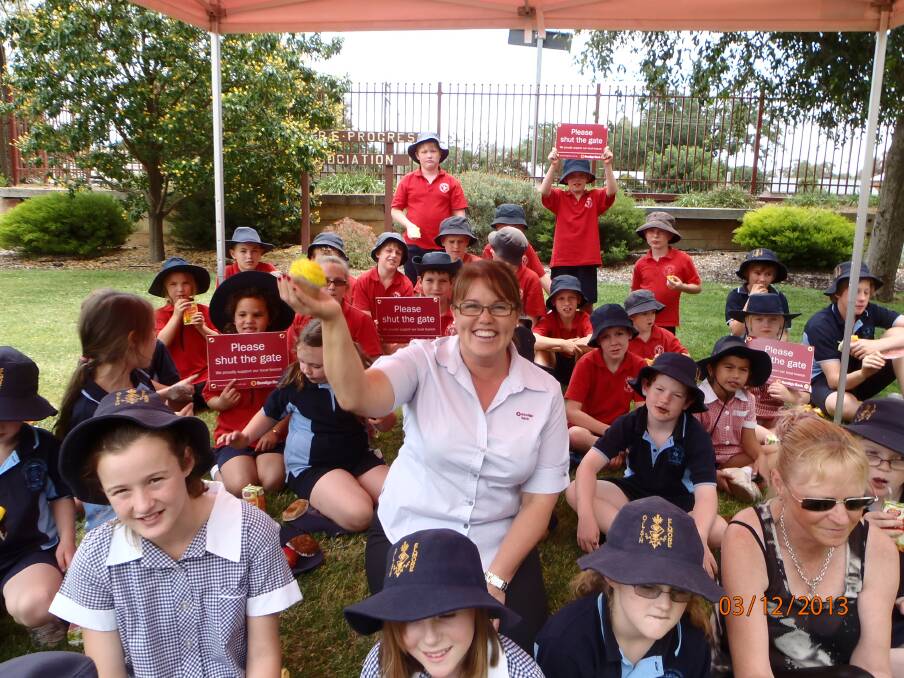 CELEBRATING: Tracie Kyne with students from Elmore Primary School and Our Lady of the Sacred Heart. Picture: SUPPLIED