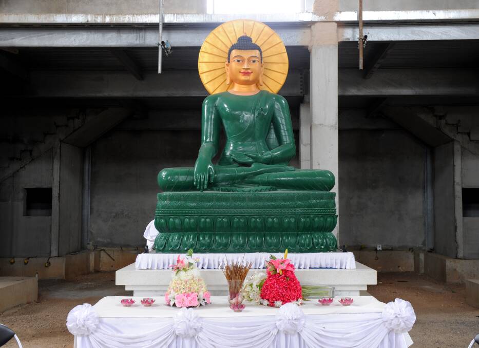 RELIC: A statue in the Great Stupa. Pictures: JODIE DONNELLAN