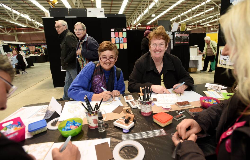 TALENTED: Diane Patterson and Sandy Robertson at the Kaszazz Paper Kraft stand. Picture: JODIE DONNELLAN
