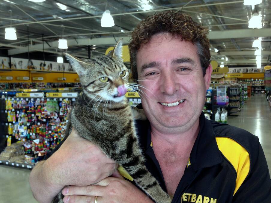 ON THE PROWL: Petbarn Kangaroo Flat store manager Paul Epworth with one of the eligible bachelorettes.