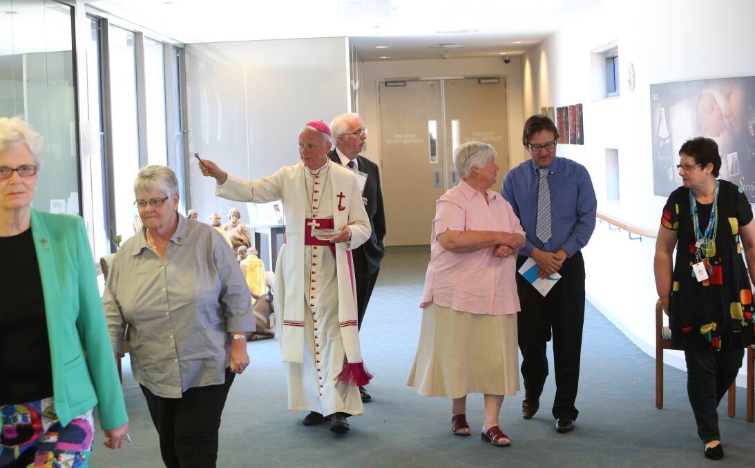 Bishop of Sandhurst Les Tomlinson blessing the building. Picture: PETER WEAVING