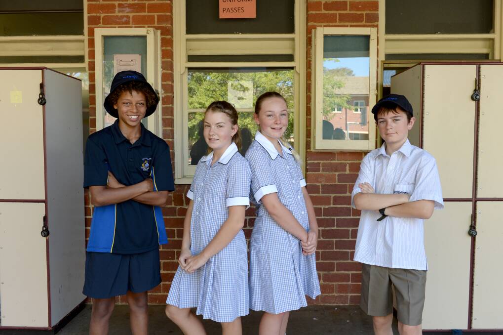 Year 7 students Kai Daniels, Sharni Barker, Brehana Danger and Josh Madell in the Marist house uniform. Picture: JIM ALDERSEY
