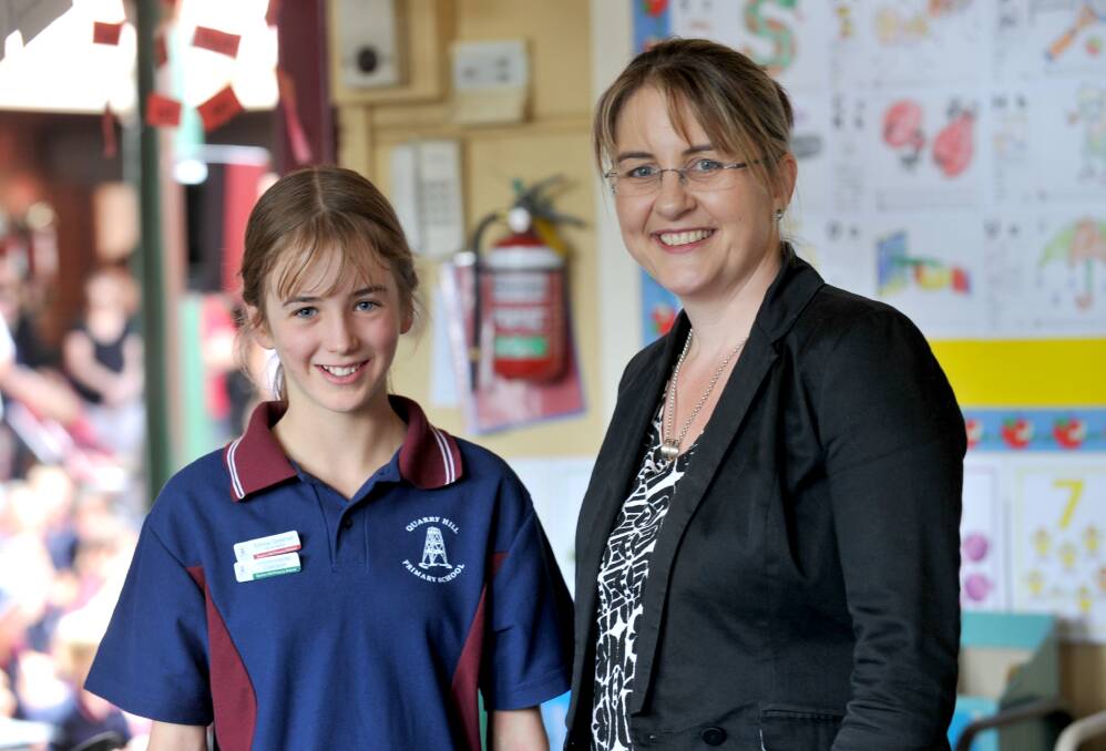 Emma Greenall receives her badge from Jacinta Allan MP. Picture: JODIE DONNELLAN