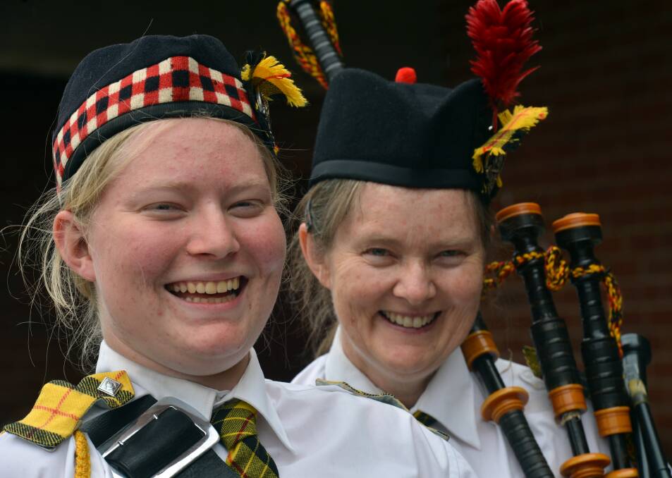 LAUGHTER: Laura and Joy Spark from the Clan McLeod Pipe Band. 
