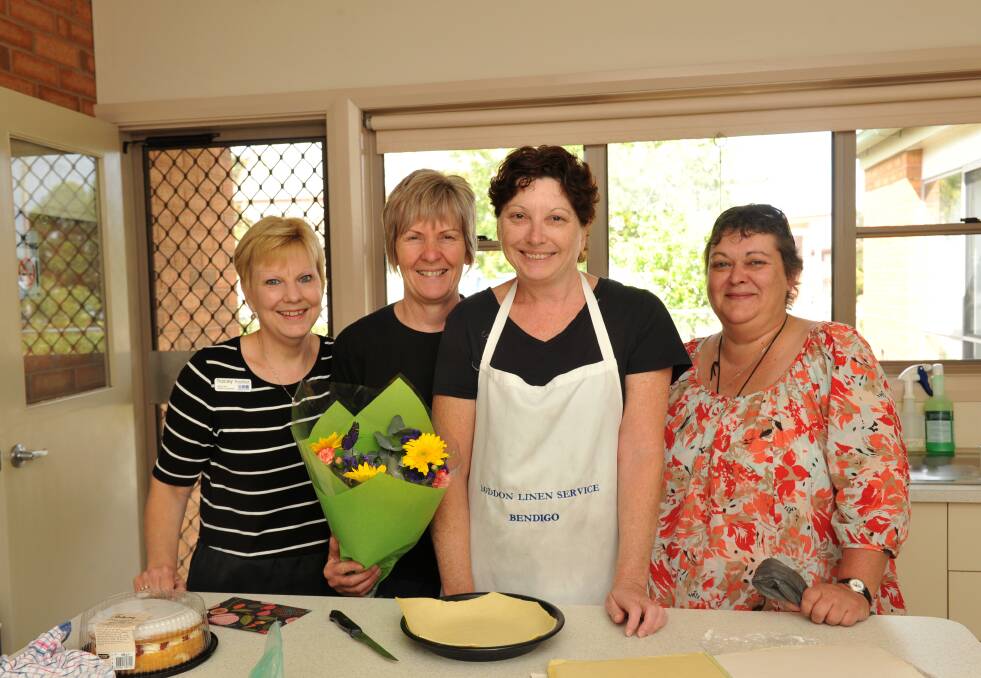Tracey Frochot, Rosie Taylor and Jodie Block say farewell to fellow staff member Sherry Taylor. Picture: JODIE DONNELLAN 
