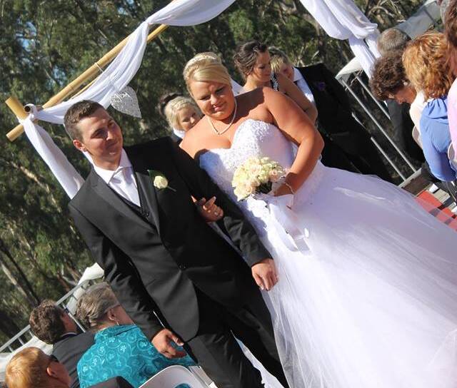 JUST MARRIED: Sally and Pat Cox walk down the aisle. Picture: SUPPLIED