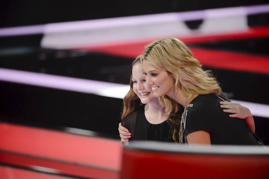 INSPIRATION: Grace and her mentor Delta Goodrem on the set of The Voice Kids. Picture: CONTRIBUTED