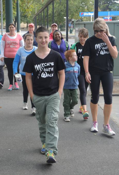 WALK: Mitchell Bourke and supporters during Mitch's Autie Walk in March.