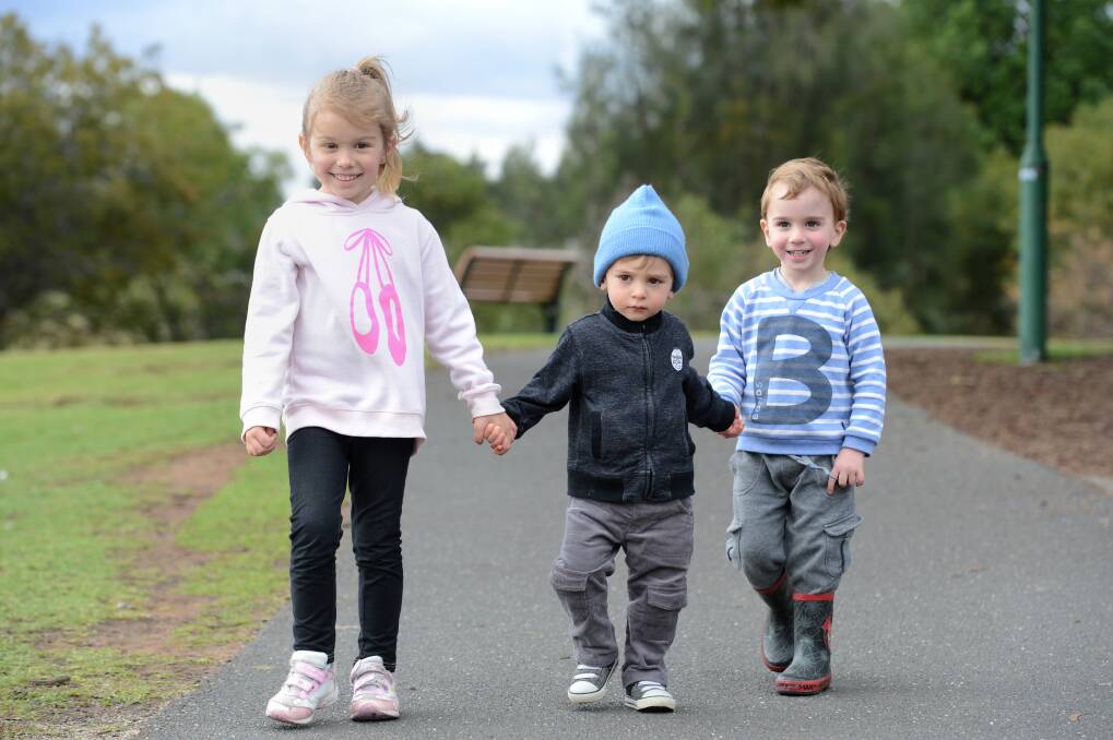 Kassidy and Axel Cail with Isaac Baré ahead of Pound the Pavement for Prems walk. Picture: JIM ALDERSEY
