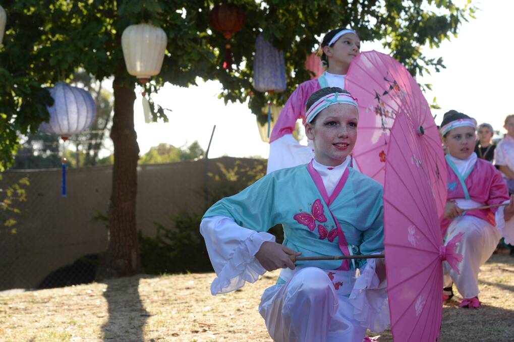 Martine Truscott performs at the Chinese New Year traditional Chinese Lantern Festival at Joss House.  Picture: JODIE DONNELLAN 