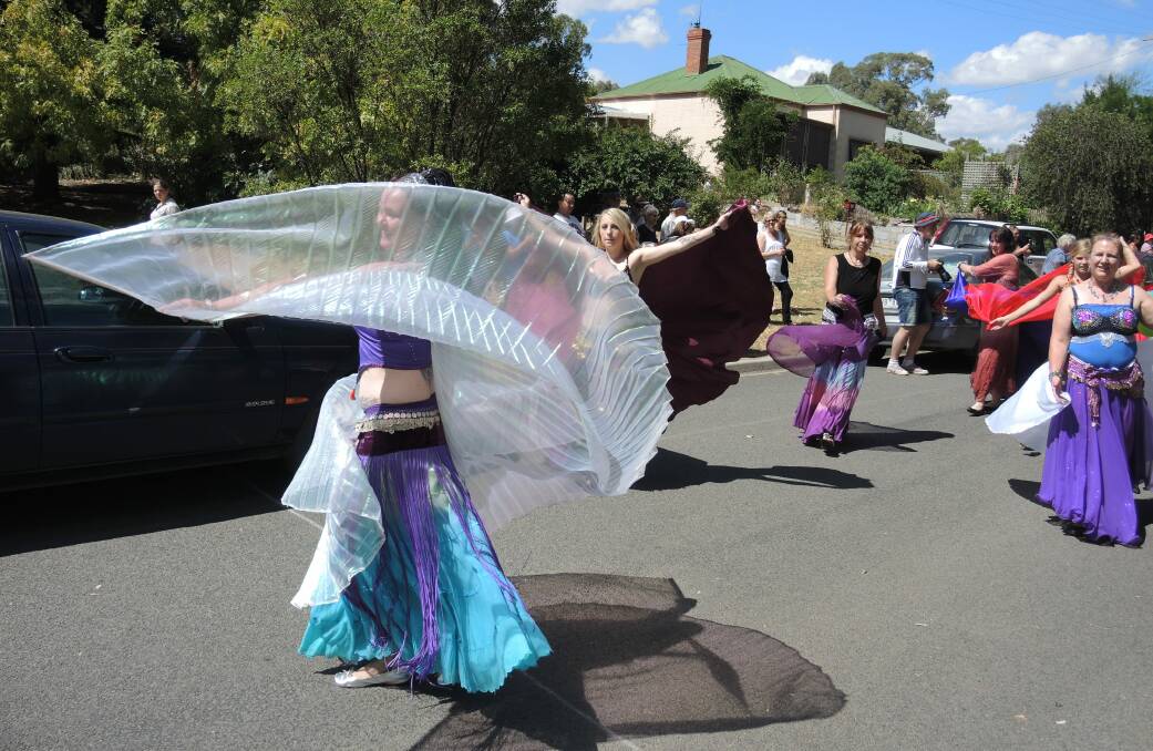A Kashmiri belly dancer swirls along High Street in the Harcourt Applefest street parade. Picture:  DOROTHY COOK