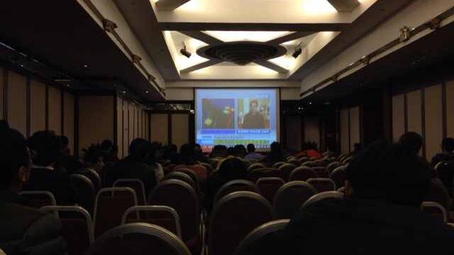 A photo taken from the Lido Hotel conference room in Beijing where
families watched the press conference live.