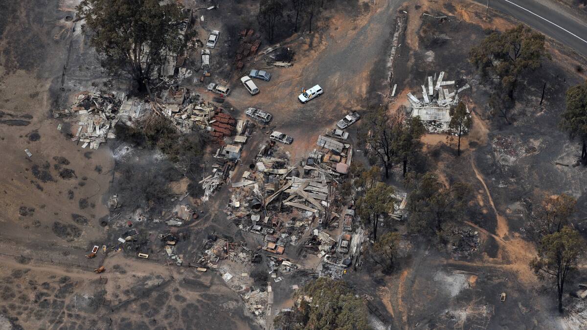 FEBRUARY 8, 2009: This aerial photograph shows the scale of the fire one day after Black Saturday. Picture: Laura Makepeace