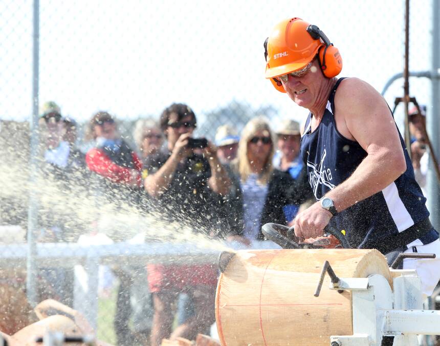 The woodchopping was a popular event at the charity carnival. 
