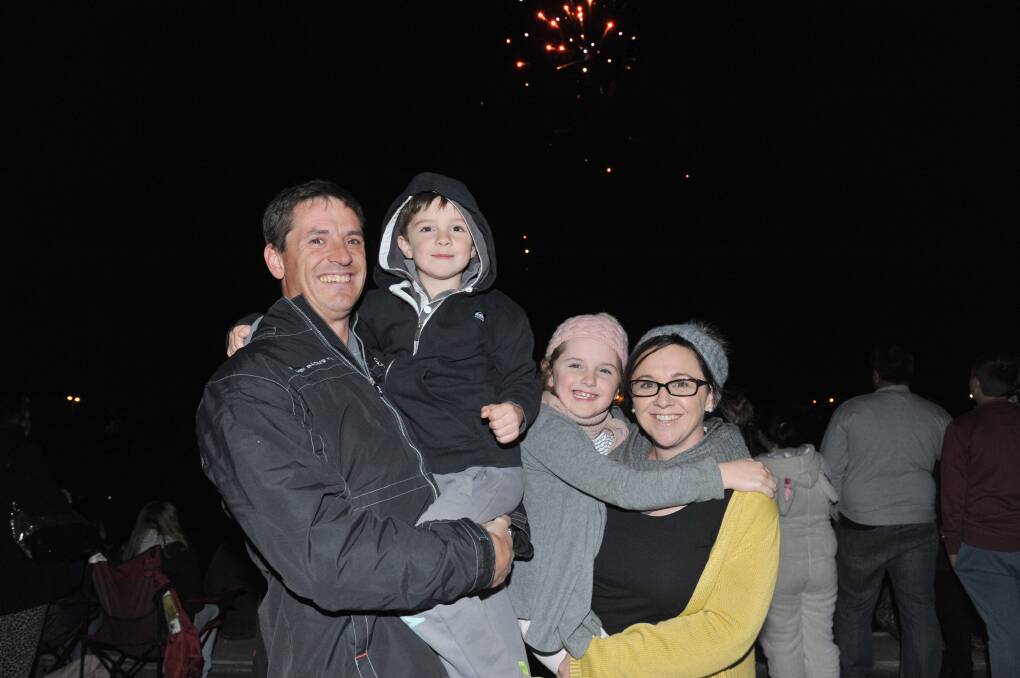 Jason, Will, 5, Maggie, 7, and Shannon Bourke from Hamilton enjoying the fireworks at the Tom Flood Sports Centre.