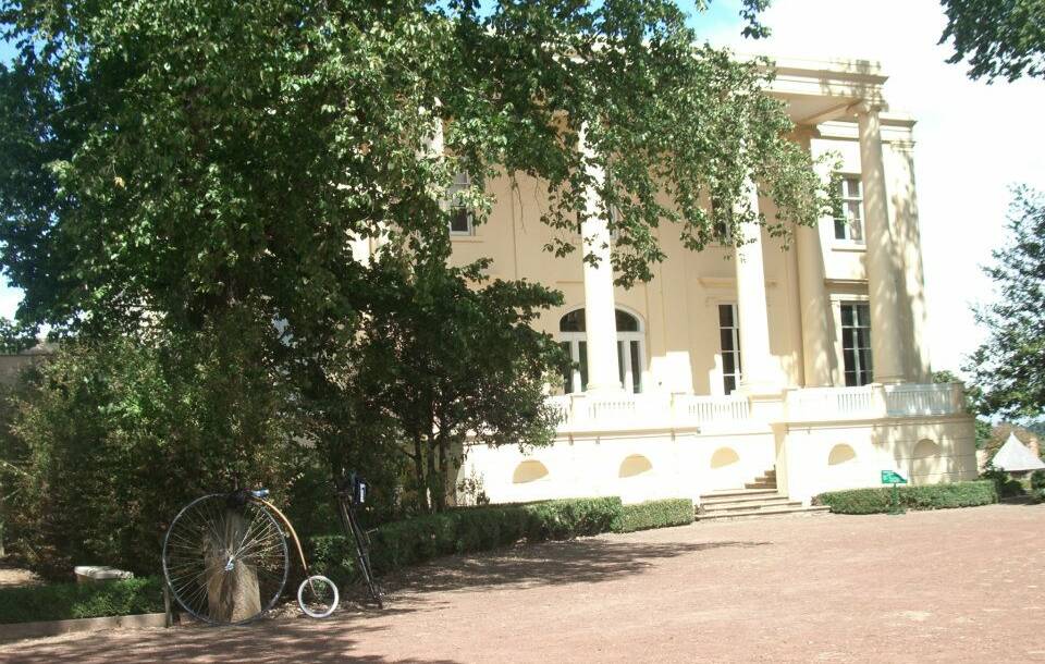 PICTURESQUE: A penny farthing rests outside the historic Clarendon House near Evandale. 
