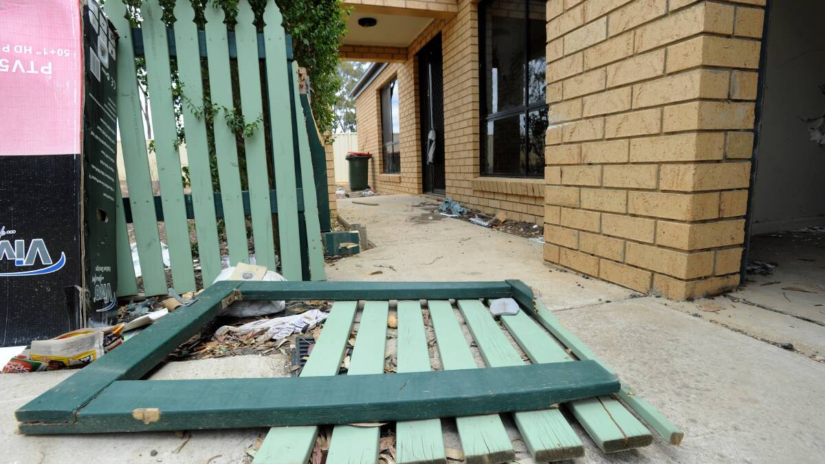 TRASHED: A broken gate is just part of the damage at the Bendigo home. Picture: JODIE DONNELLAN