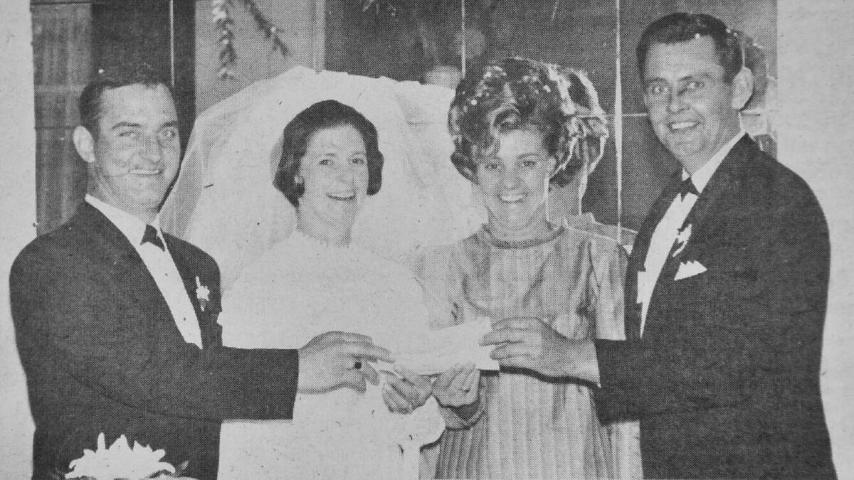 Mr and Mrs J Hughes pictured with their attendants following their wedding at St Paul’s Church of England, Bendigo. The bride is the former Miss J Foster.
