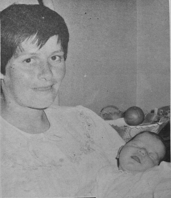 Mrs Graeme Saunders of Golden Square with her third baby Jeanette Elizabeth, born June 14. 
