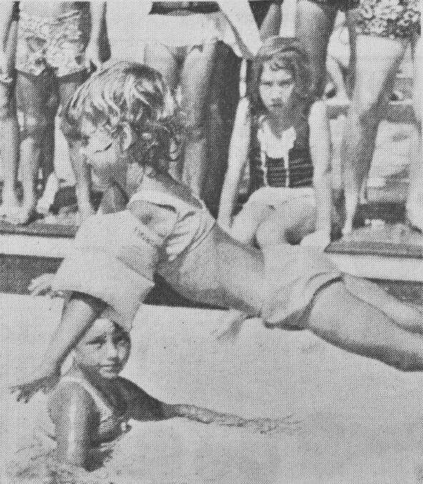 Three year old Christine Street dives into the Eaglehawk Pool
