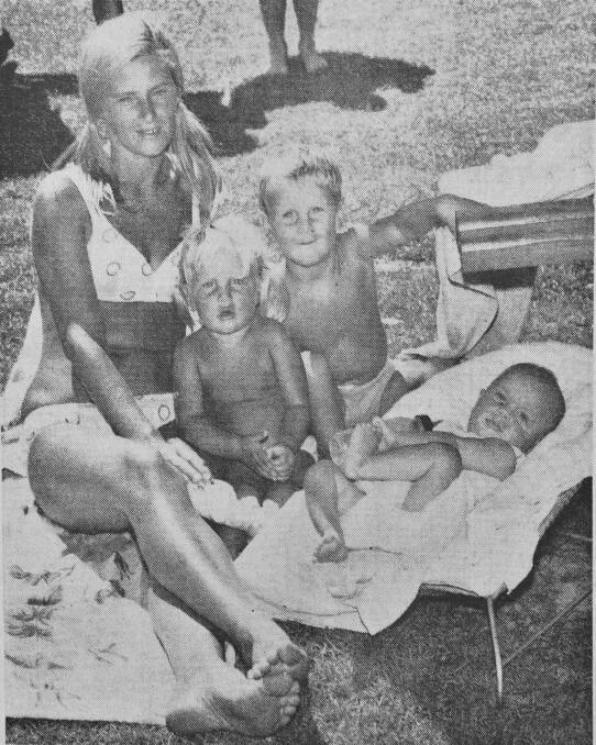 Mrs PJ Blezzard with her three children Felicia, Graham and Malcolm at Brennan Park Pool.
