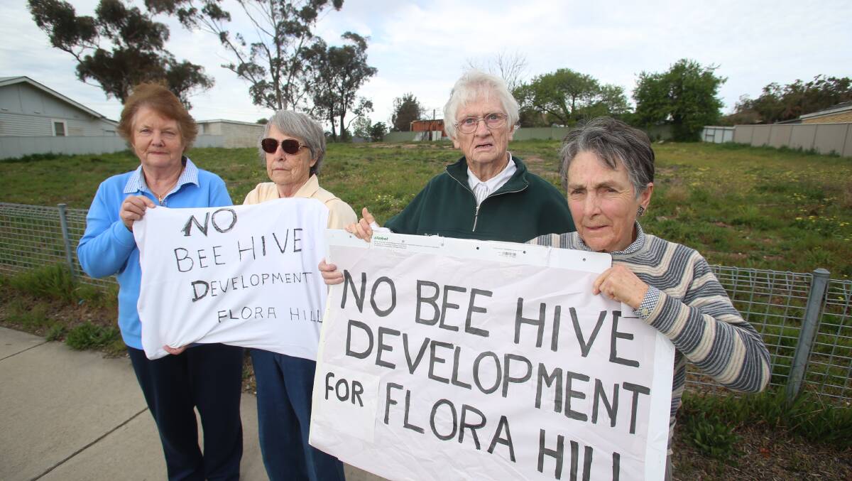 Curtin Street Flora Hill, residents, Anne Roberts, Jeanette Clark, Lil Bridger and Margaret Kane outside the site of the proposed development.