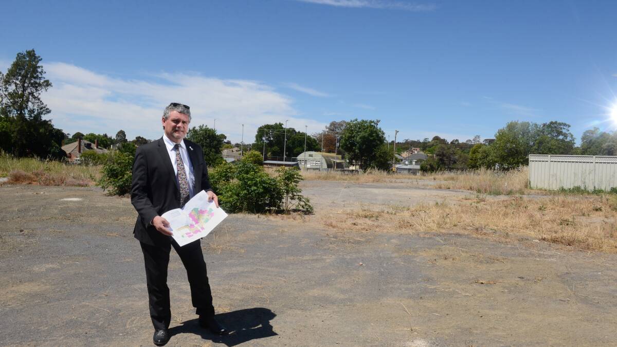 BEGINNINGS: CEO of Haven Home Safe Ken Marchingo on the Sidney Myer Haven housing site in 2013 before construction began. Picture: JIM ALDERSEY
