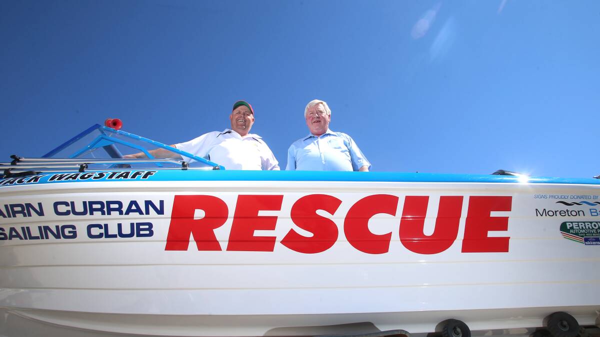 AFTER: Craig Ginnivan and Perrows Automotive Paints owner Ken Sheers in the newly-painted boat. Picture: GLENN DANIELS
