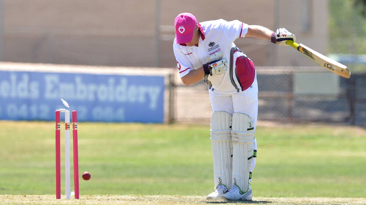Greg Bickley is bowled.