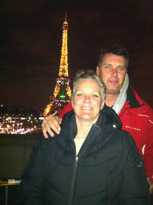 Fiona and Steven Oliver in front of the Eiffel Tower in Paris.