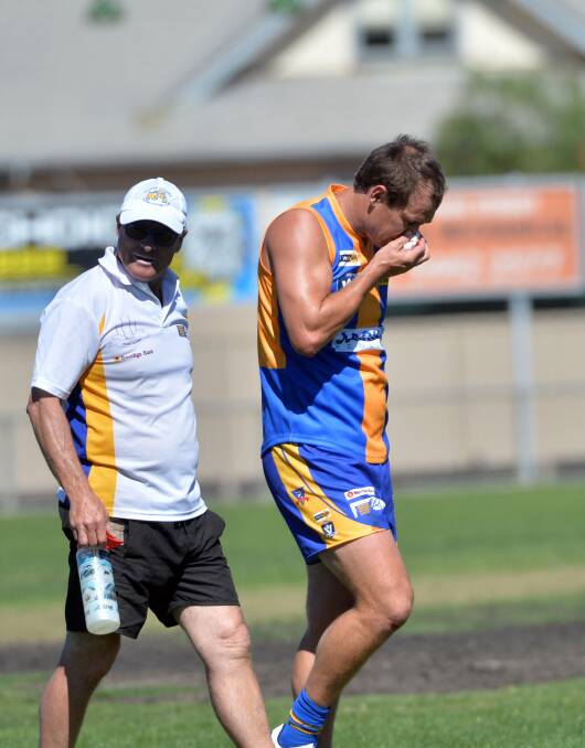 OUCH: Golden Square's Corey Jones leaves the field on Saturday after a head clash. Picture: GLENN DANIELS