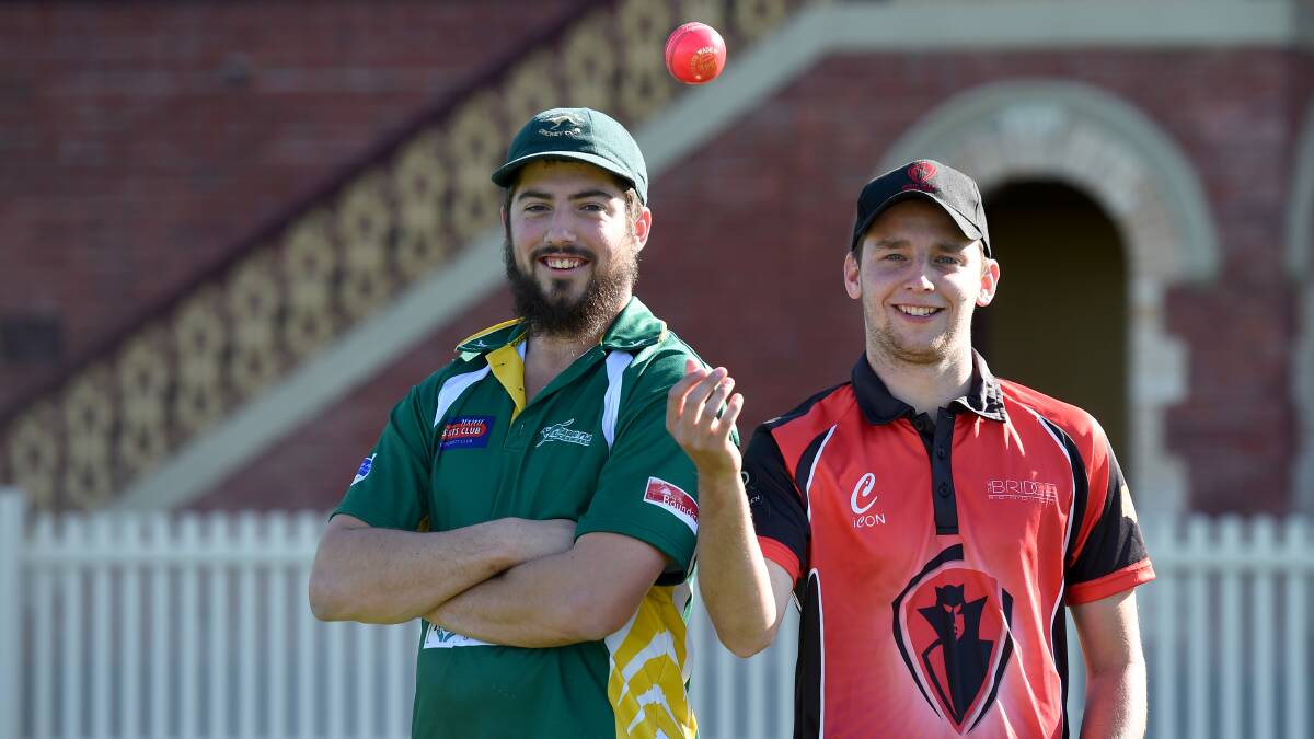 Kangaroo Flat’s Brent Hamblin and White Hills captain Rhys Irwin with one of the pink balls that will be used in their BDCA two-day day-night game at the QEO.