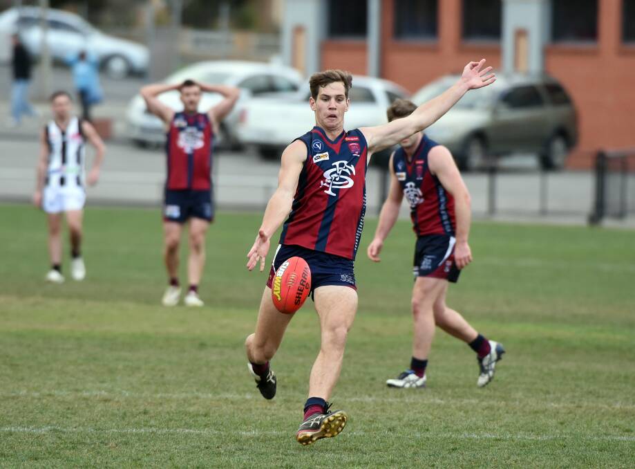 ON TARGET: Matt Thornton kicks one of his two goals against Castlemaine on Saturday. Picture: LIZ FLEMING