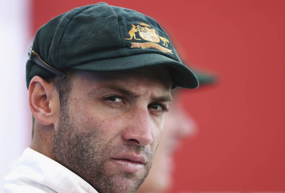 CRICKET TRAGEDY: Phillip Hughes pictured in his treasured baggy green.