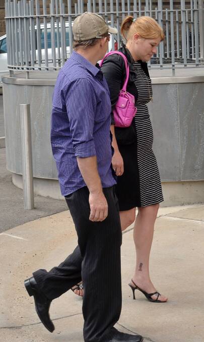 Mathew Tisell and Casey Veal attend the Supreme Court.