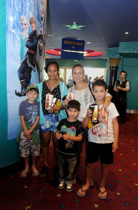 Brady, Tyler, Samantha and Ethan Saville with Aunty Barb to see Cloudy with a Chance of Meatballs 2. Picture: JODIE DONNELLAN 
261213