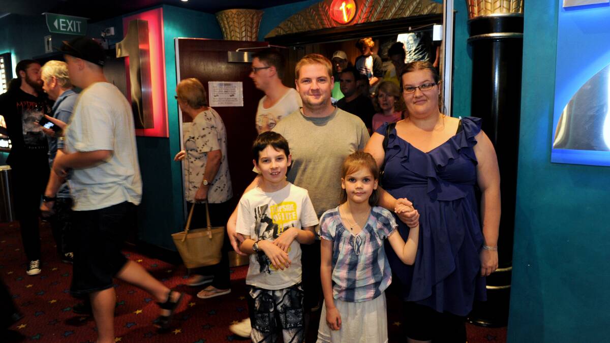 Phillip Greenfield with Damian, Isabella and Alice Higgins after the first screening of The Hobbit. Picture: JODIE DONNELLAN 
