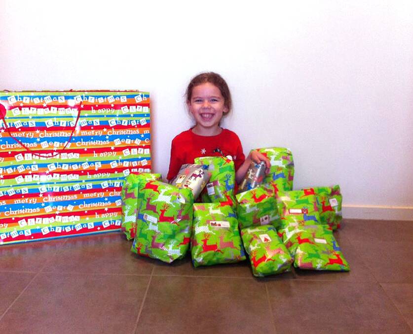 GIVING: Trinity How Kee with the presents she gave to patients at Bendigo Health. Picture: CONTRIBUTED
