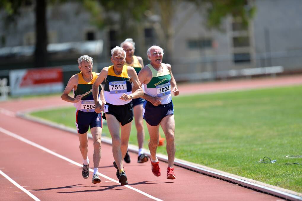 Max Brook, John Justice amd Bob Schickert in the 1500m. Picture: BRENDAN McCARTHY
