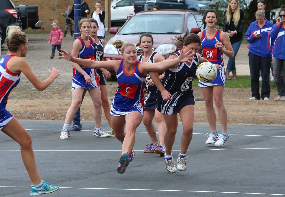 HANDS OUT: Tamara Gilchrist attacks the ball. Pictures: PETER WEAVING