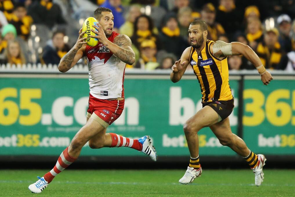 Lance Franklin and Josh Gibson. Picture: GETTY IMAGES