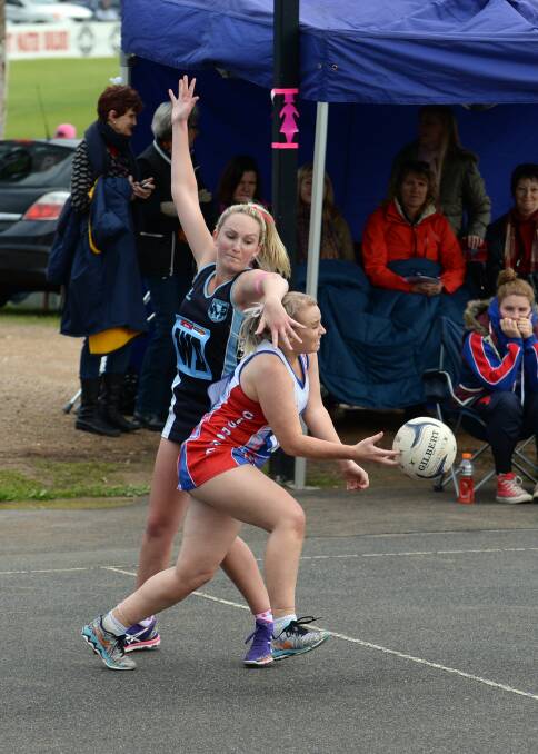 PUSHING FORWARD: Gisborne mid court player Codie Madden forces the ball ahead.