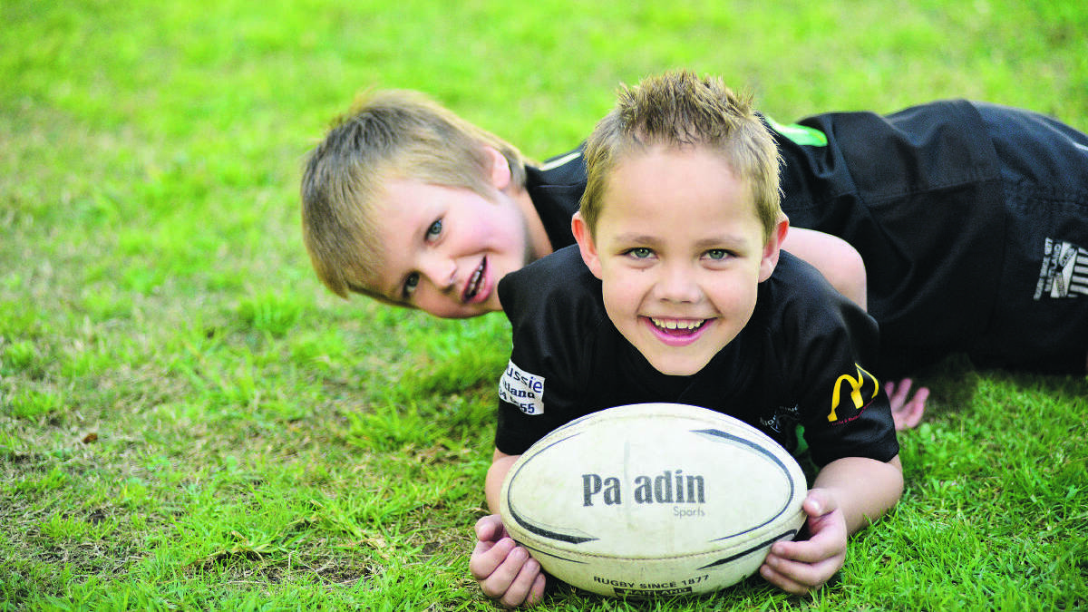 It has been a tough few months for Nate Wetini (with ball), the seven-year-old who suffered serious brain injuries when a metal pole went through his head earlier this year, but through it all his best buddy Xavier Gollan has been right by his side.