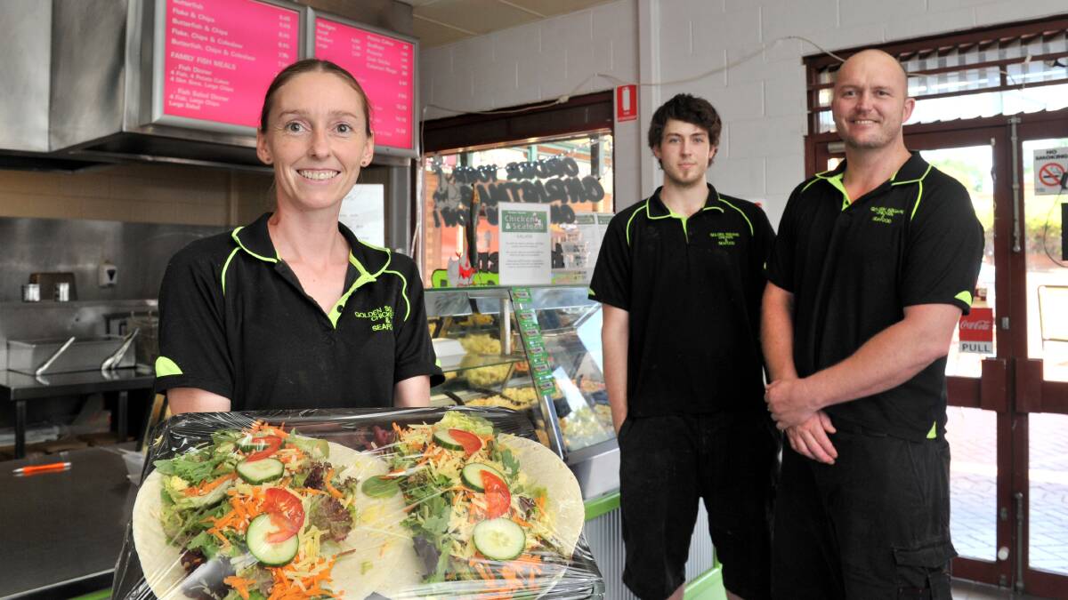 TASTY: Jenni Benson, Josh Benson and Justin Whitehead from Golden Square Chicken & Seafood.  Picture: JODIE DONNELLAN 
