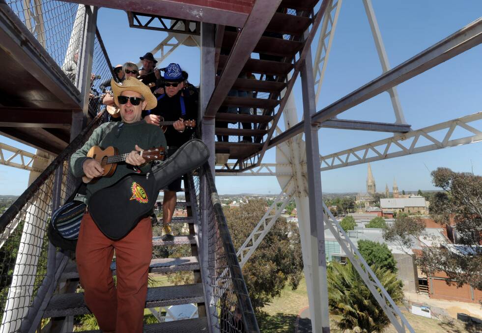 World record of ukulele players at the top of the poppet head to launch the Bendigo Blues and Roots Music Festival. 
Picture: JODIE DONNELLAN 