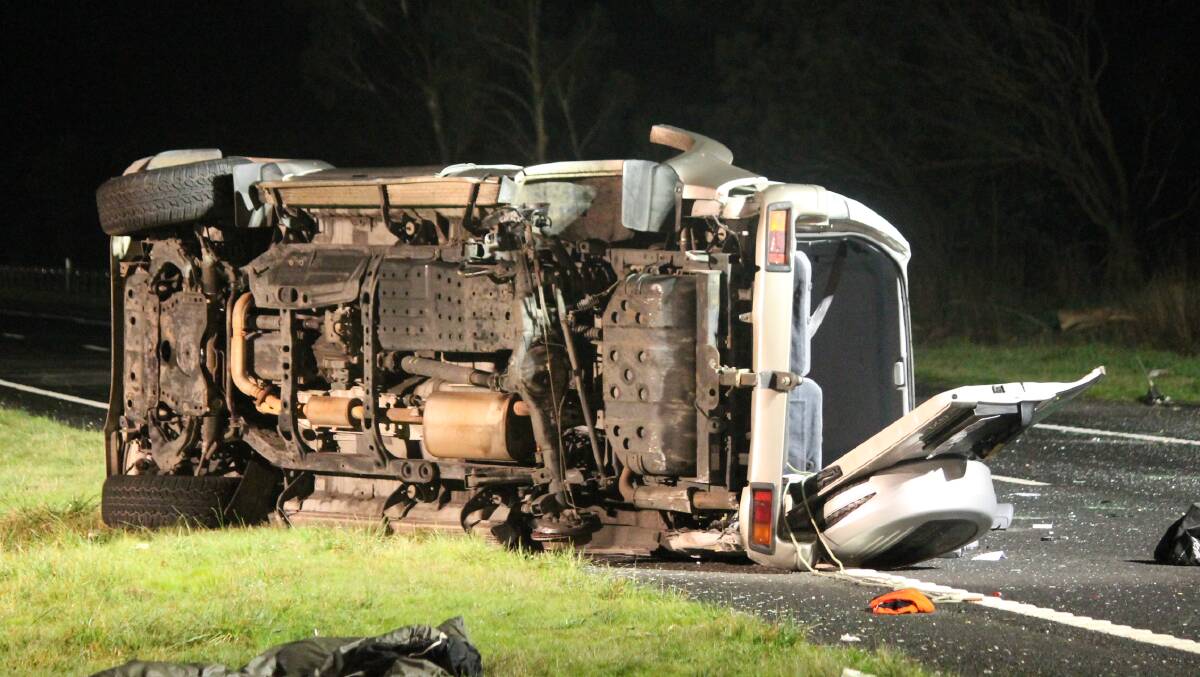 WRECKAGE: The scene of the crash that claimed two lives on the Calder Freeway in Macedon on Friday night. The cause of the accident is under investigation. Picture: Liam Beaton/The Age
