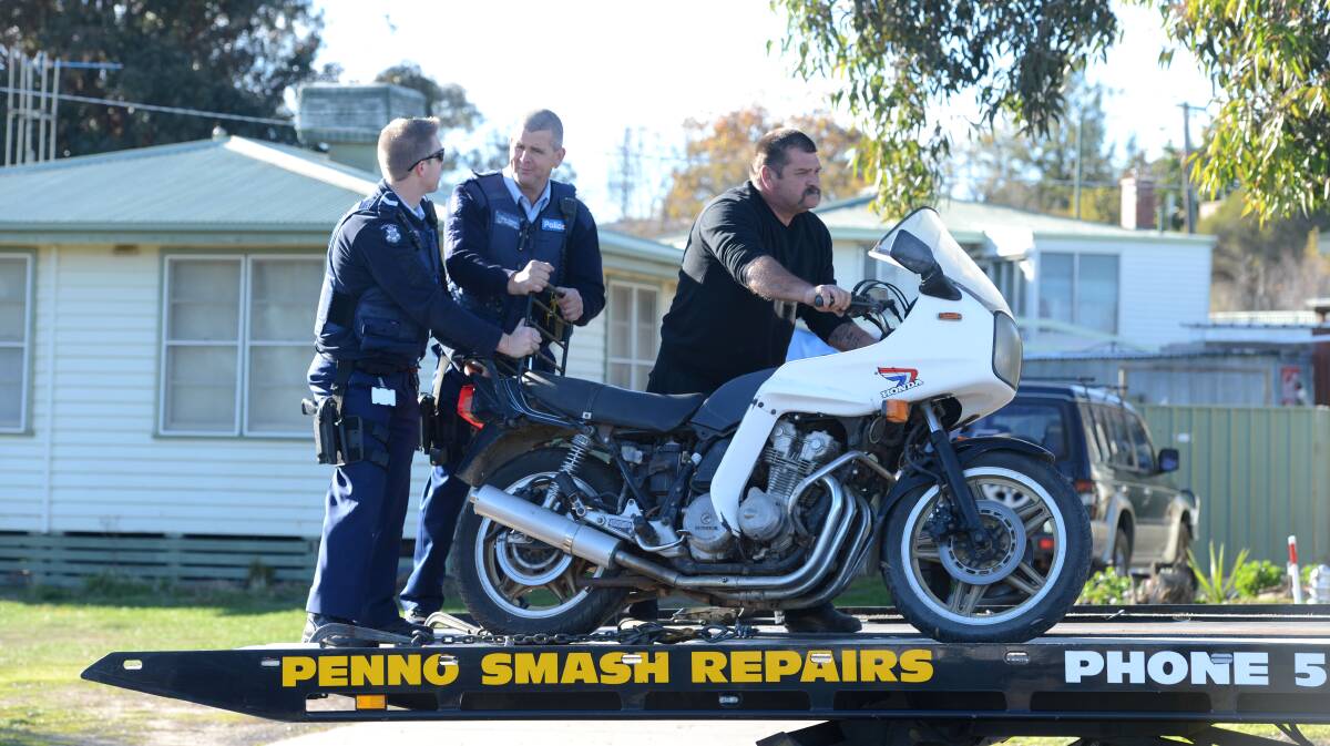 Police recover a stolen motorcycle. Picture: JIM ALDERSEY