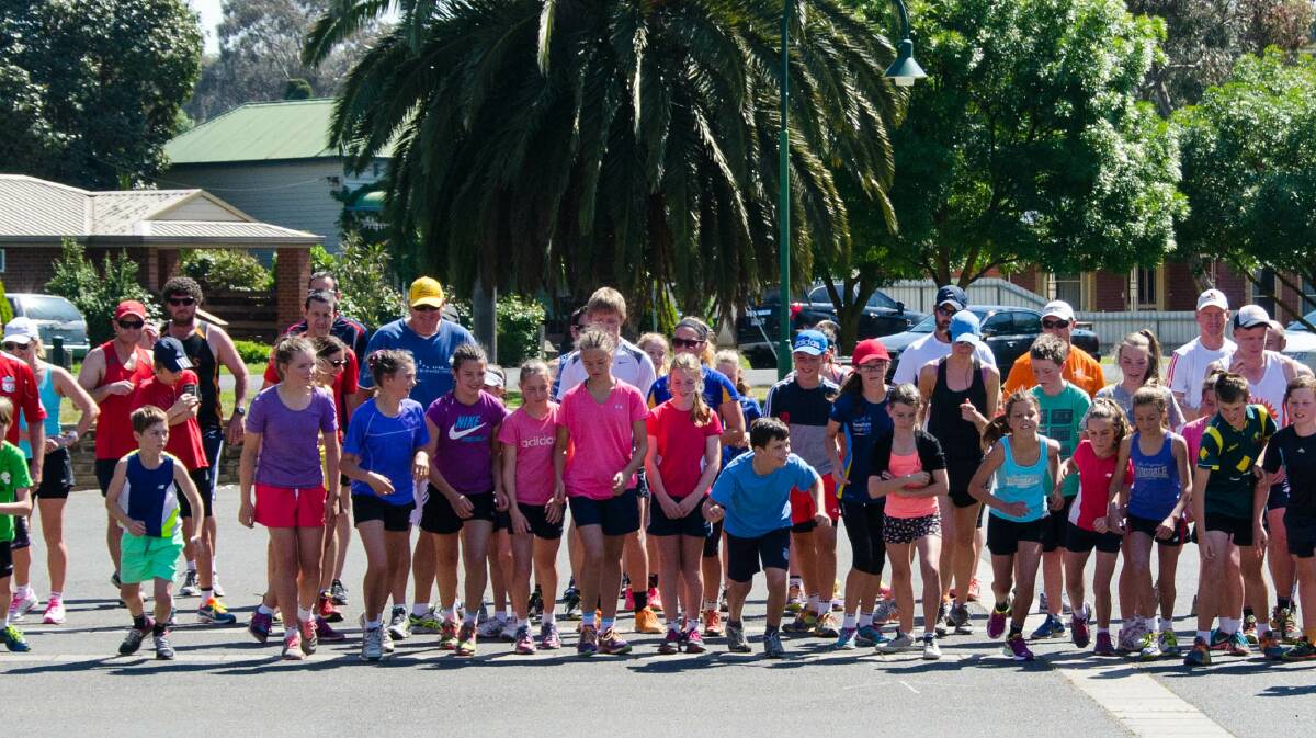 ON THE STARTING LINE: Pupils from St Therese's Primary School take part in the Community Fun Run