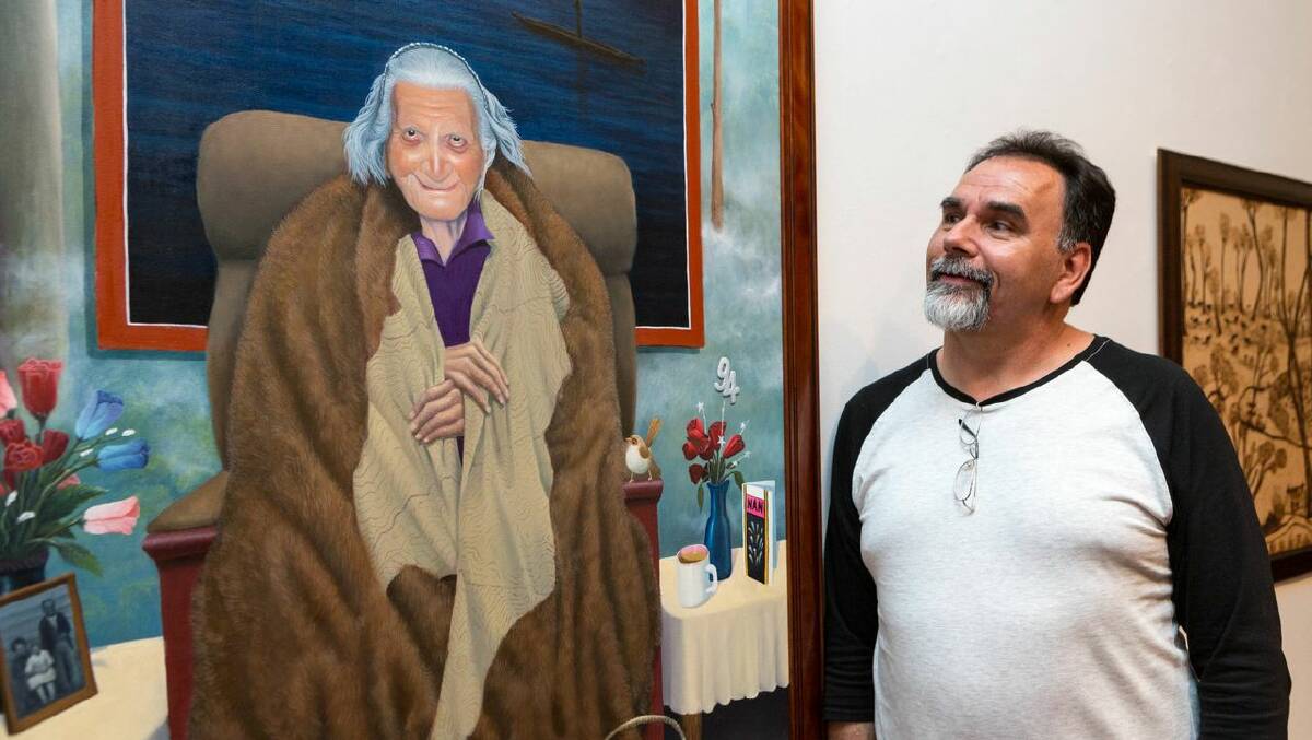 Artist Ray Thomas with his award-winning painting.