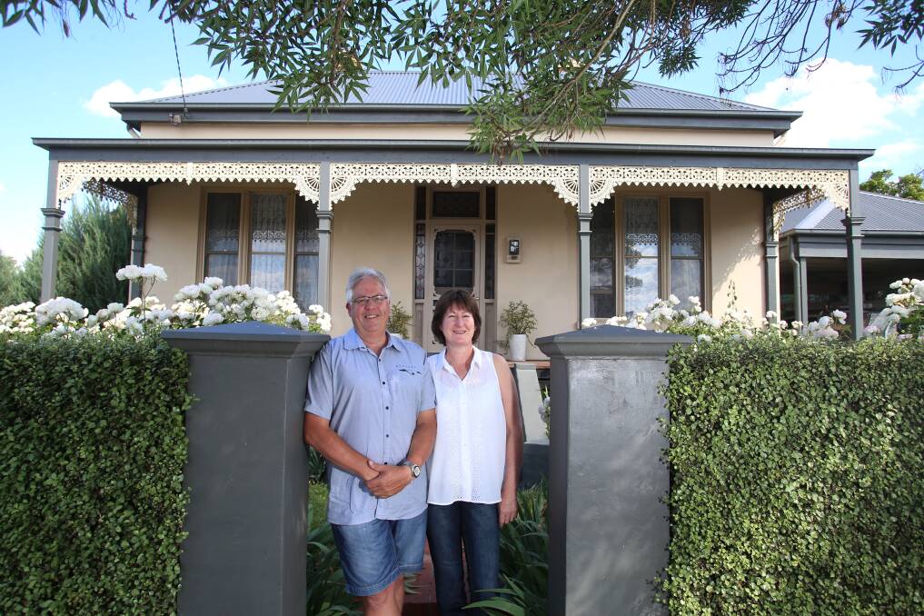 SETTLED: Russell and Julie Keating outside their home on Langston Street. Picture: PETER WEAVING